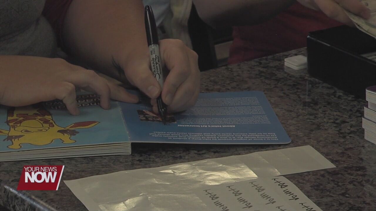 Book signing with proceeds going towards organization